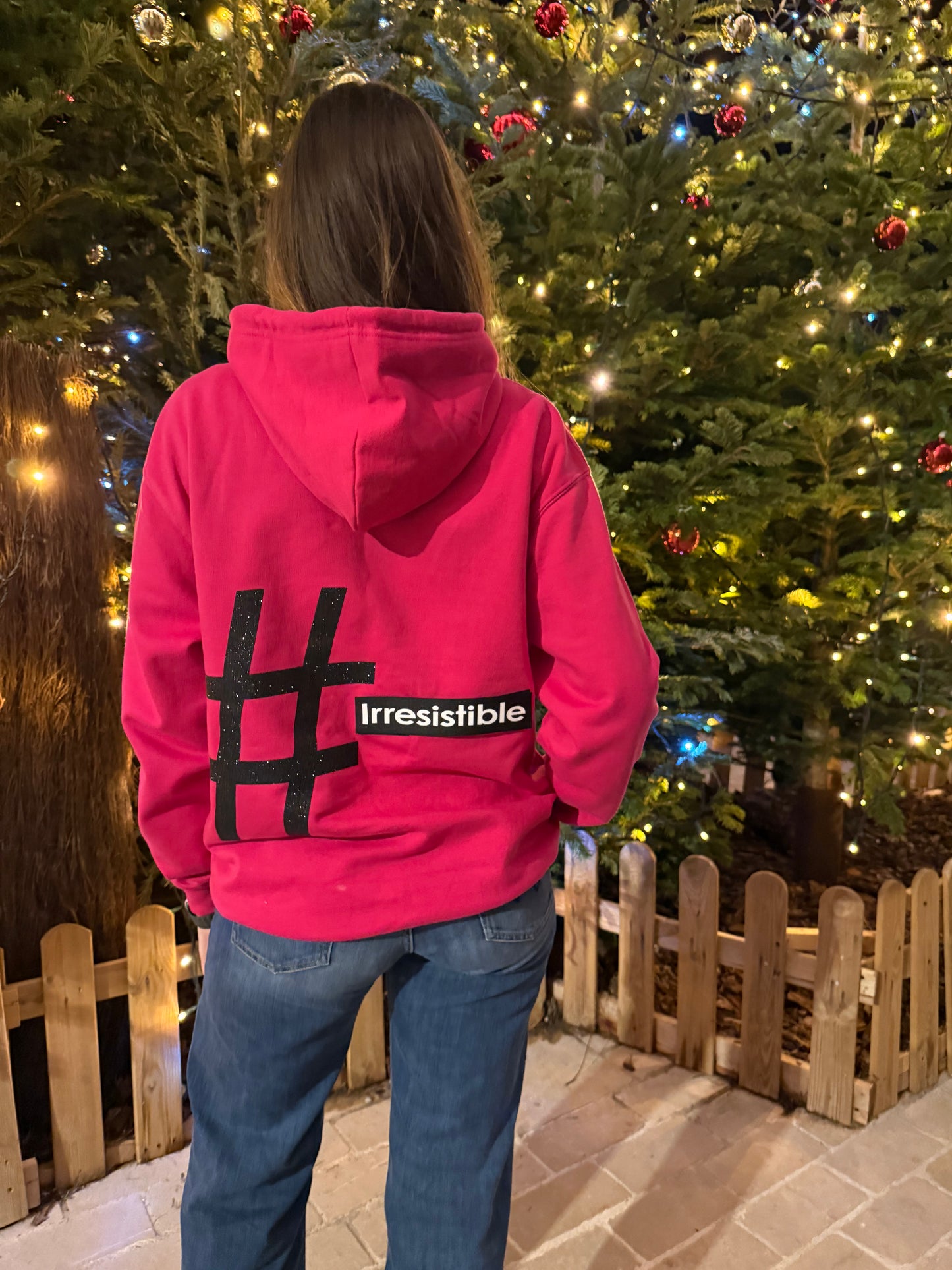 Pull fuchsia et noir pailleté