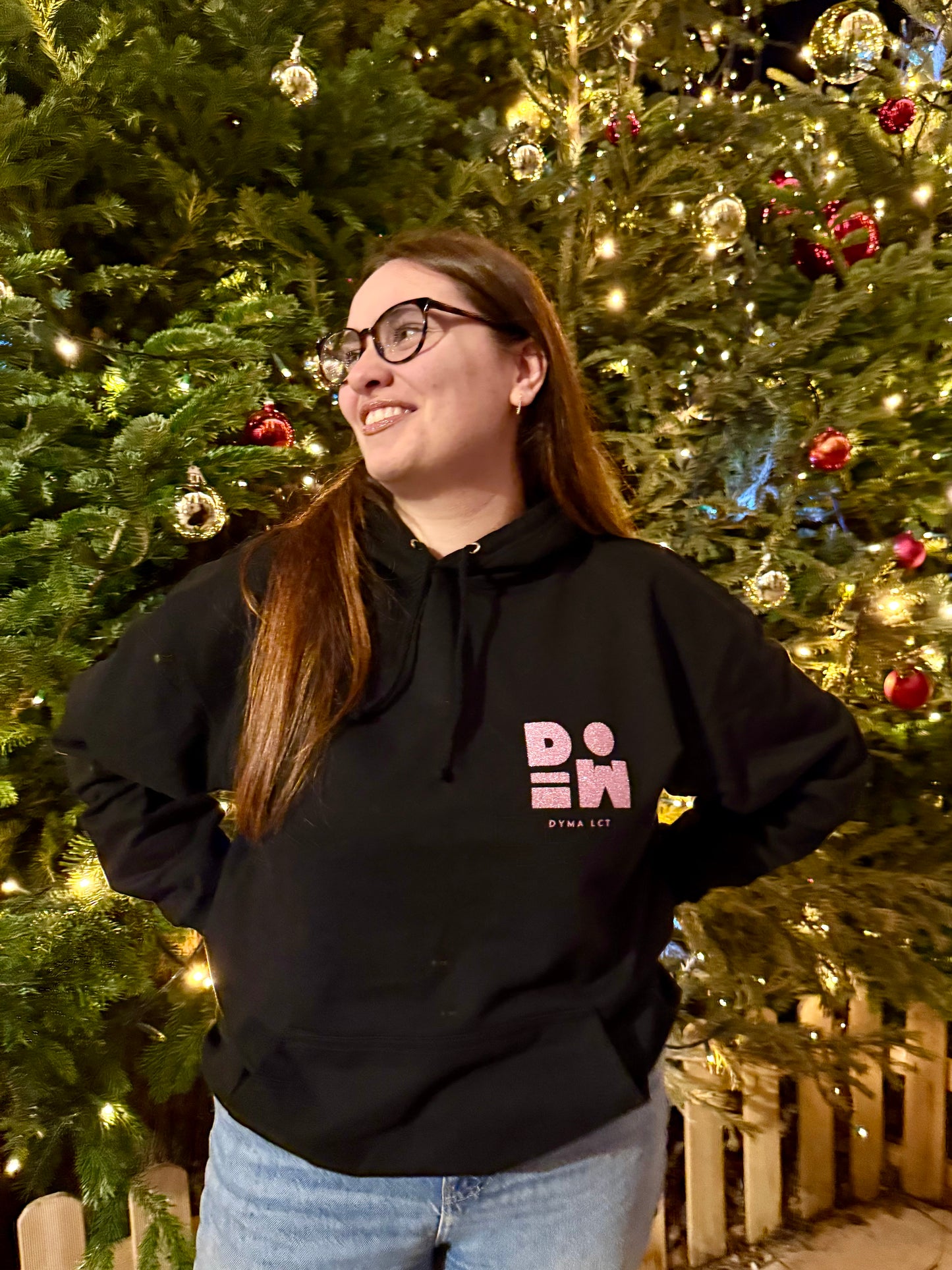 Pull noir et rose pailleté