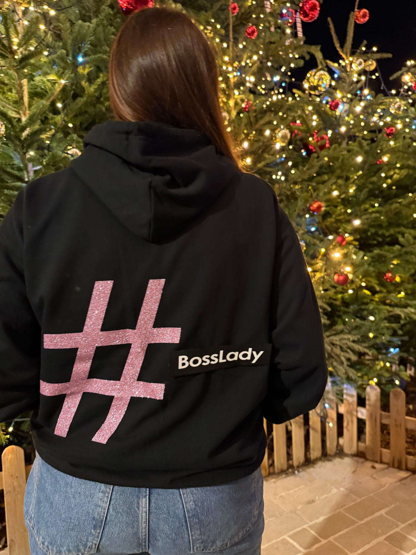 Pull noir et rose pailleté