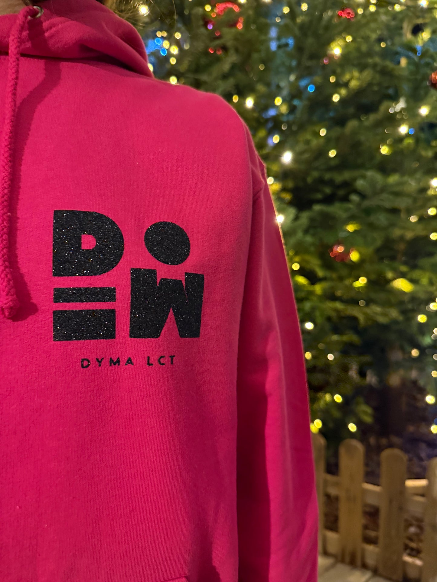 Pull fuchsia et noir pailleté